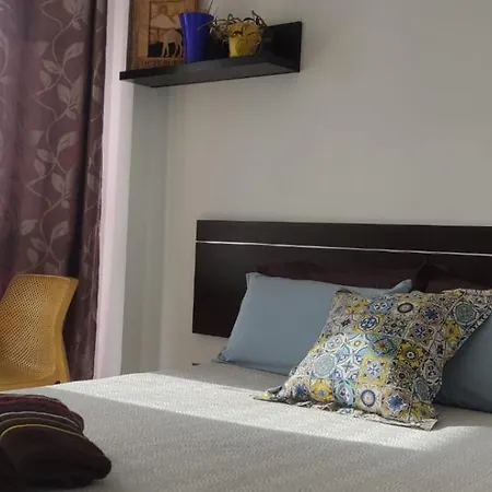 Quarto em Acomodações Particulares Roomholiday J&a